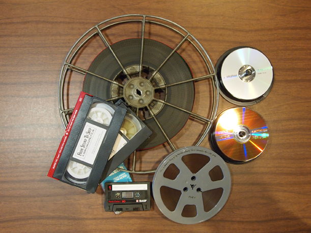 A selection of media from the MCHS collection, including film, videotape, cassettes, CDs and DVDs.