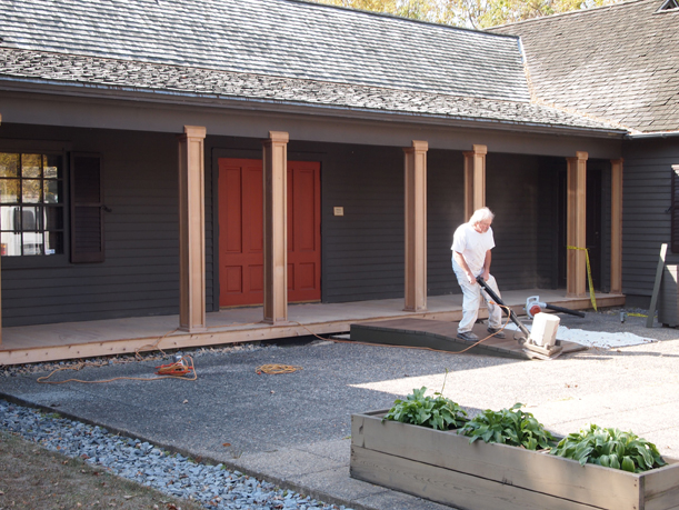 http://morrisoncountyhistory.org/museumpics/porchpainting2.jpg Phil Solem sanding ramp, Weyerhaeuser Museum porch awaiting paint. Sept. 27, 2012.