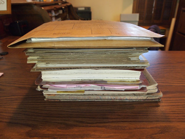 Stack of documents and photos donated to MCHS by the Little Falls Post Office, June 26, 2015.