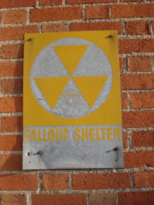Fallout Shelter sign on Little Falls Post Office, photo taken by Mary Warner, 2014.