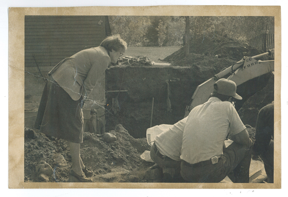 Jan Warner watching the work of cement contractor Joe Popp during excavation for the basement addition on The Charles A. Weyerhaeuser Memorial Museum, 1981. Photo by Mary Phillips for the Little Falls Daily Transcript. #1982.51.1.