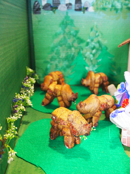 Close-up of buffalo in "Peepalo go to Church and Mama said "Bison."" The buffalo are cleverly fashioned of two upside-down bunny Peeps for legs and a chick Peep for the head. April 4, 2016.