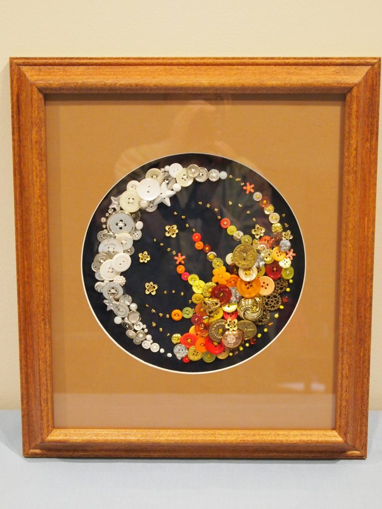 Celestial Button Art made by Marlys Sebasky, framing provided for by John Lauer, 2017 MCHS raffle prize.