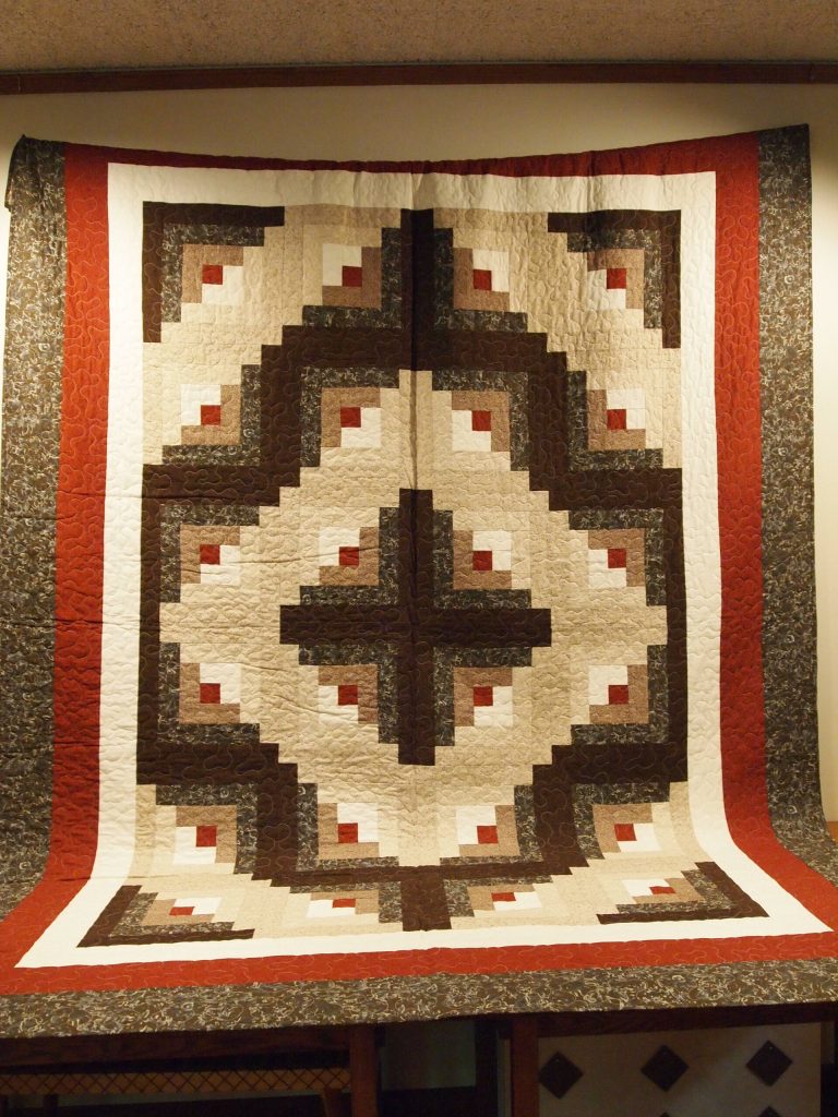 Log Cabin Quilt made by Char Welle, 2017 MCHS raffle prize.
