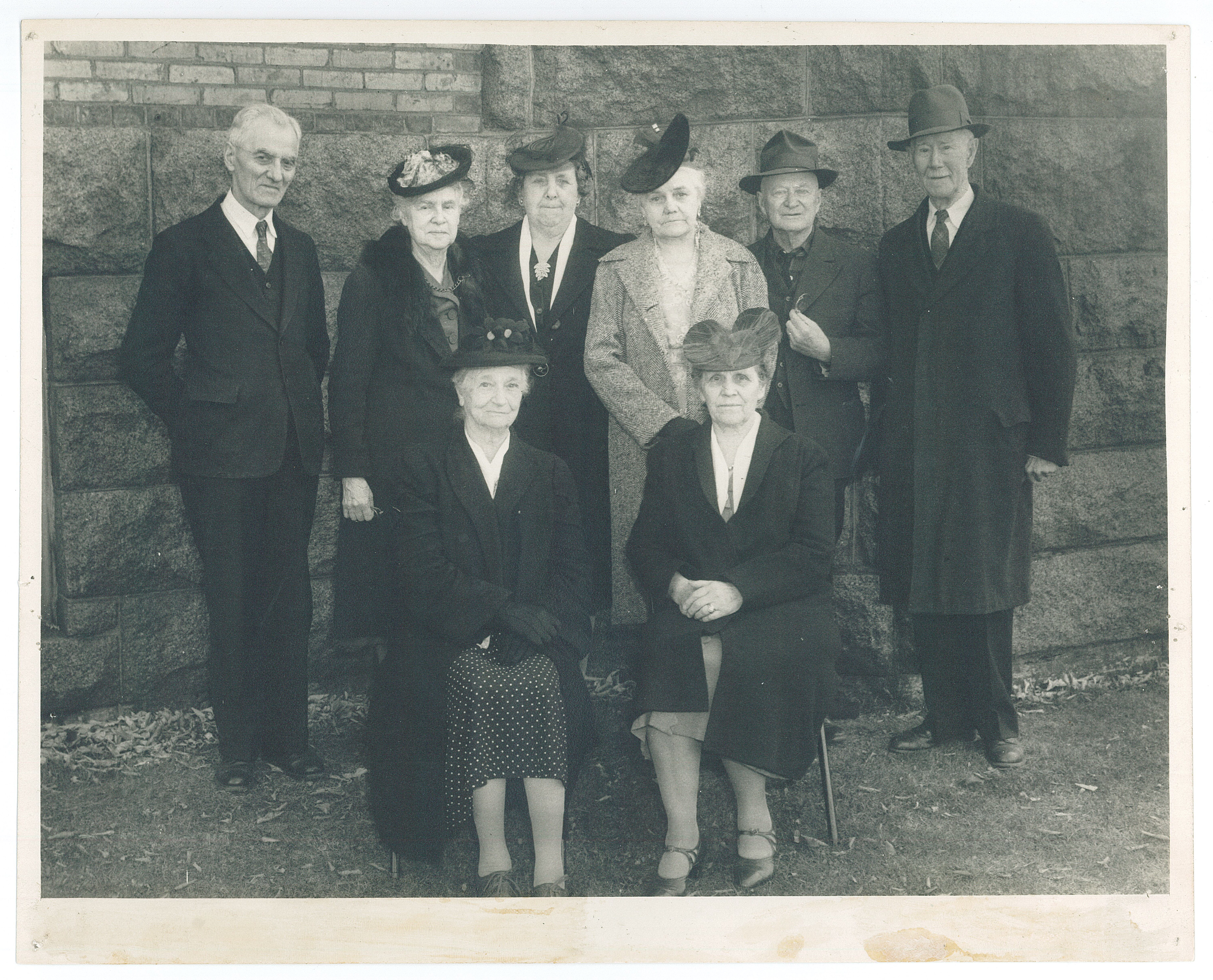Organizers of the Morrison County Historical Society in 1936. From left, standing: Val E. Kasparekt, Mrs. R.L. Cochrane, Mrs. Julius Jetka, Mrs. Warren Gibson, Mr. Warren Gibson, Mr. Harry Stillwell. Seated: Mrs Harry Stillwell, Mrs. J.K. Martin. Photo taken October 29, 1944 on the north side of the Historic Morrison County Courthouse, Little Falls, MN, by W.E. Christnagel.
