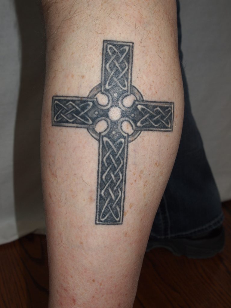 Mike Worcester's tattoo celebrating his family's Irish heritage, part of The Story Behind the Tat exhibit, 2019.
