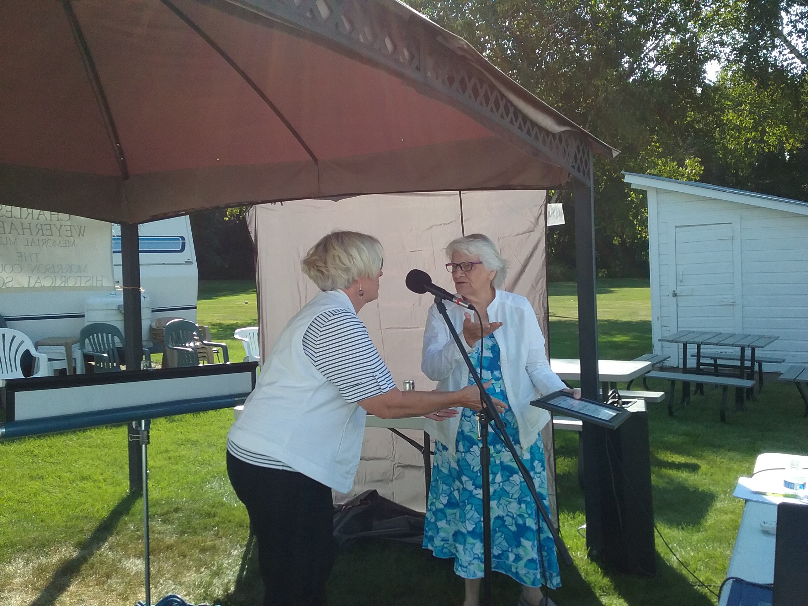 Jan Warner receiving the honor & title of Director Emeritus from MCHS Vice President Pat Quinn, Scandia Valley Vinyeards, Cushing, MN, September 8, 2018.