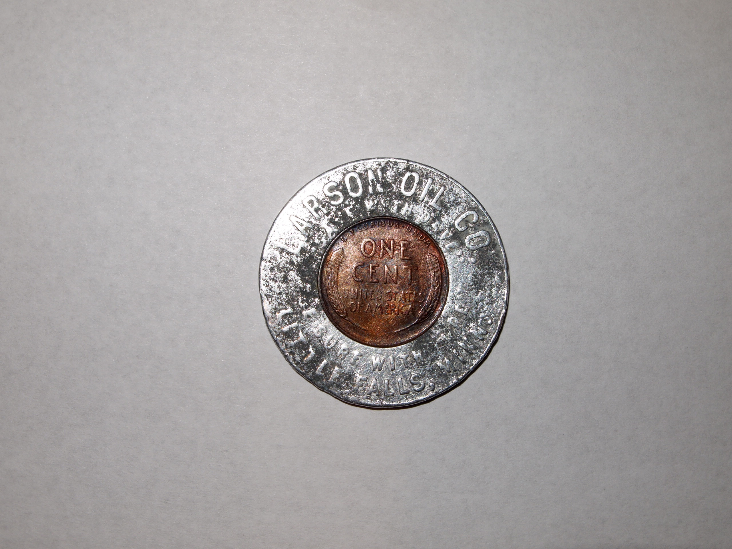 One-Cent United States Coin Token (back) from Larson Oil Company of Little Falls, Minnesota, 1946. Morrison County Historical Society collections, #2016.60.1.