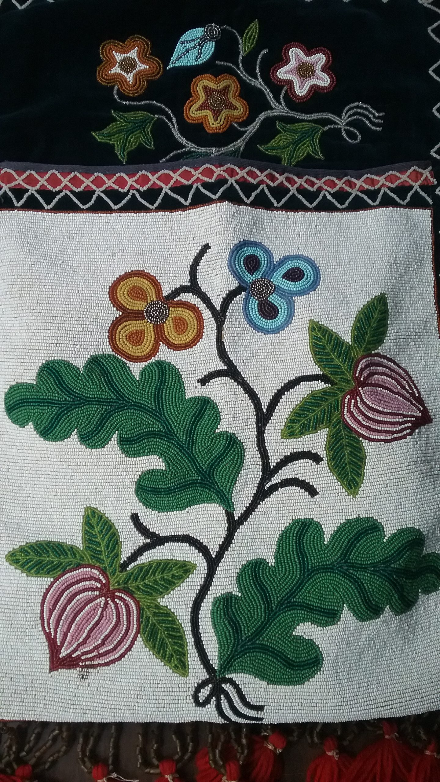 Closeup of pouch of Ojibwe gashkibidaagan owned by Ethel Gourd Hall. MCHS collections, #1954.8.1.