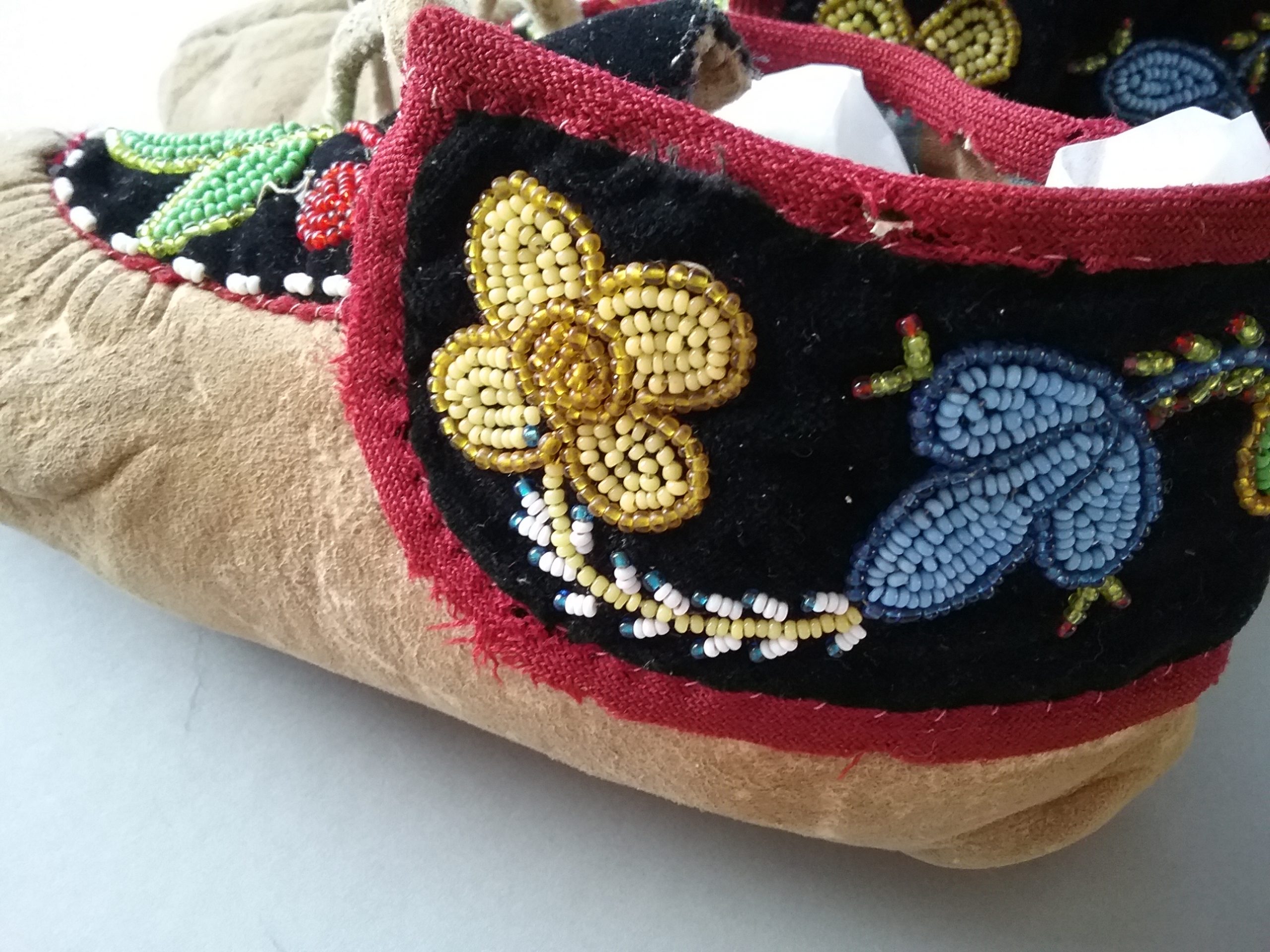 Detail on Ojibwe beaded leather moccasins. MCHS collections, #2005.97.27a&b